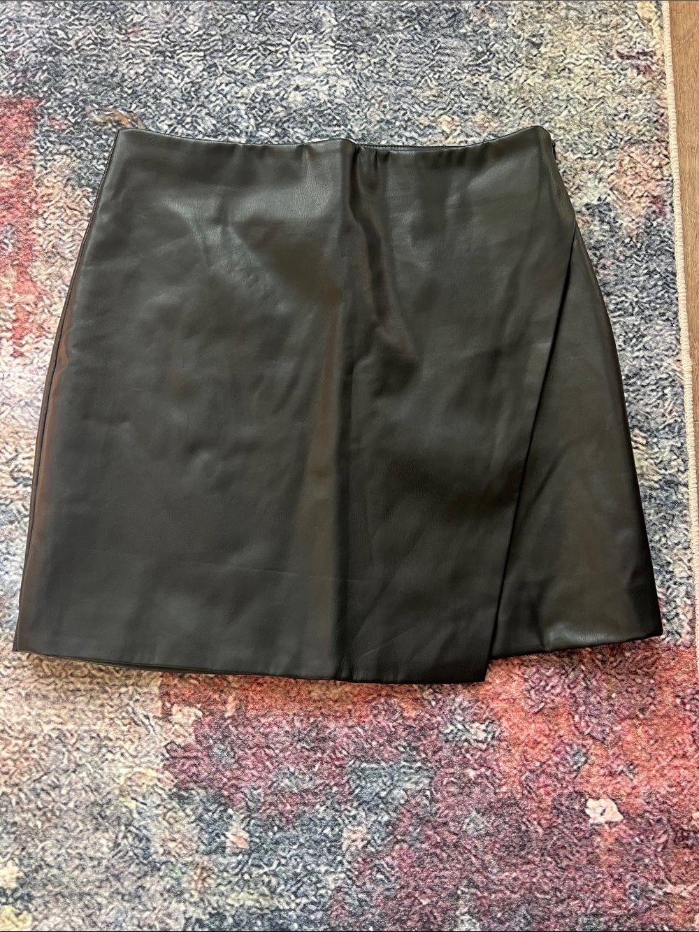 Showpo. Women’s black faux leather skirt. Size 8